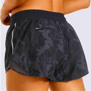 CRZ YOGA Black Camo Mid Waist Athletic Shorts with Zip Pockets Mesh Liner 2.5”